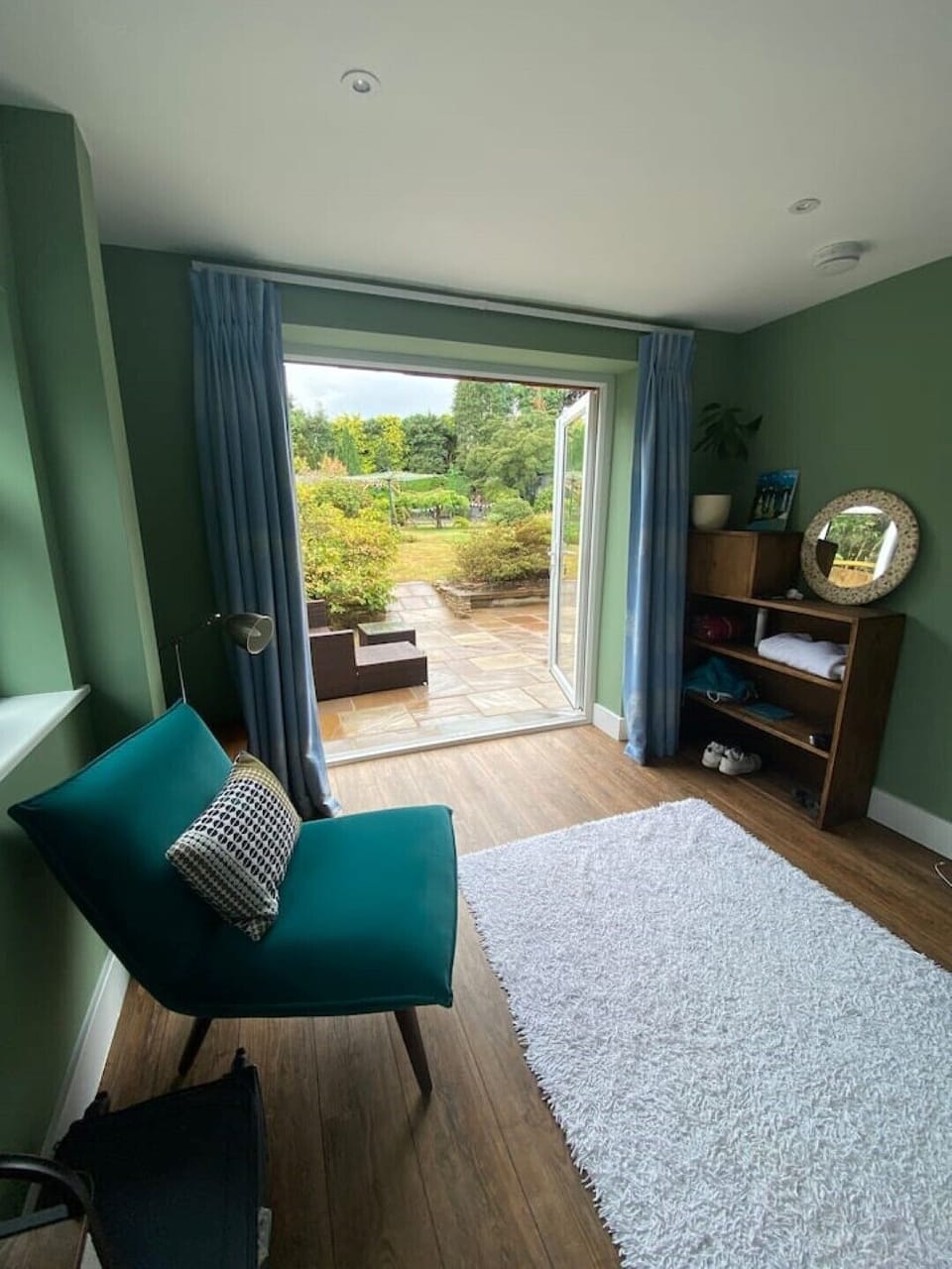 Bedroom 6. French doors to private patio. Heated floor. King bed (not shown)