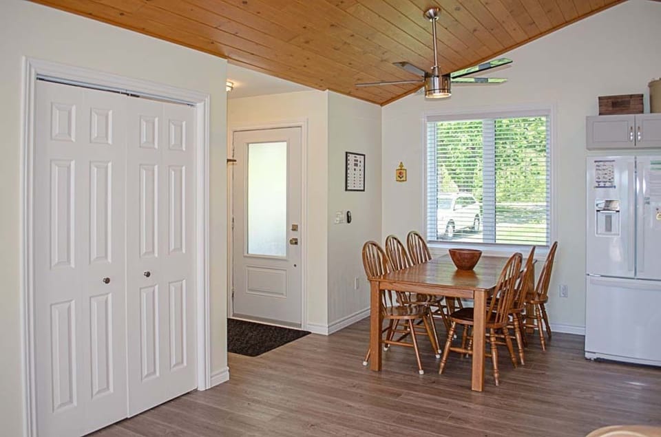 Dining area with kitchen to the right
