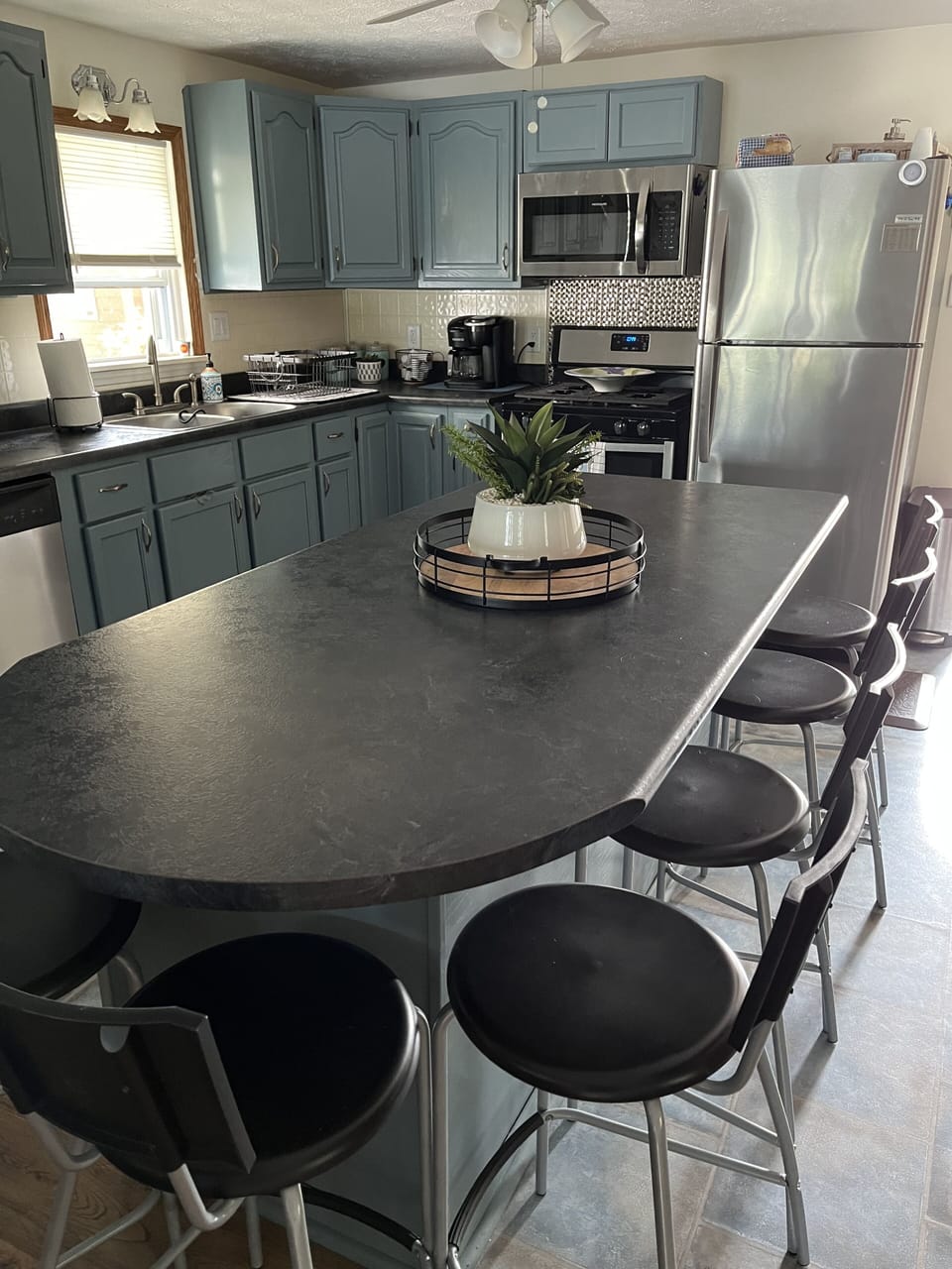 Large eat-in kitchen opens to living area. 