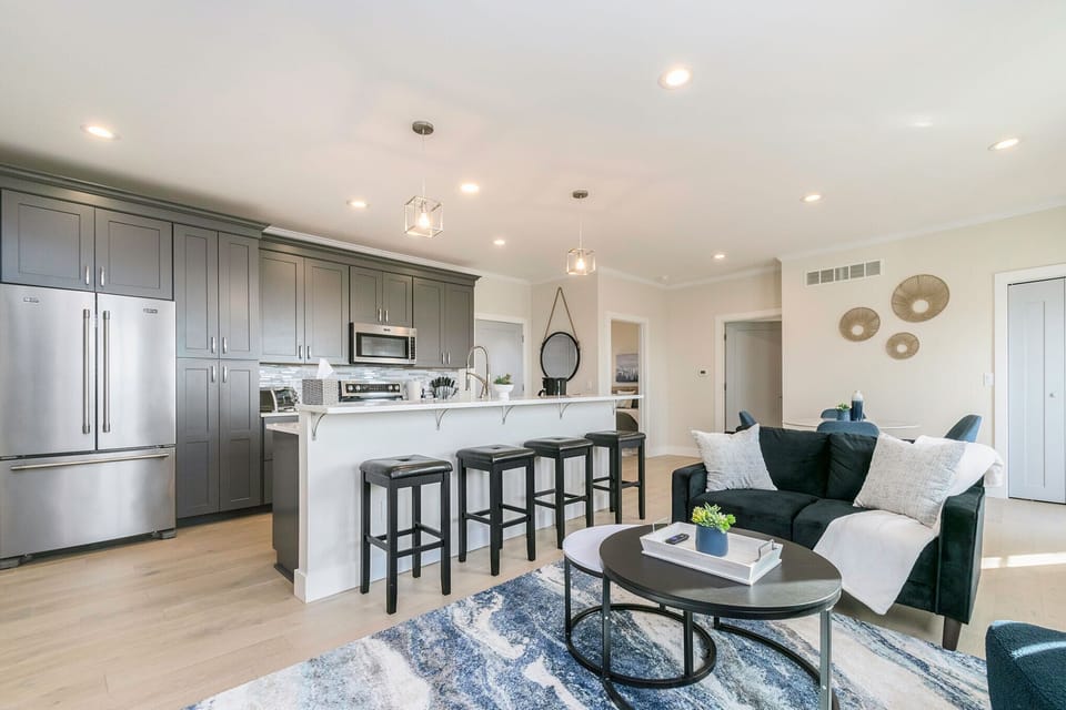 Savor the joy of culinary delights at our inviting open kitchen and stylish bar counter.