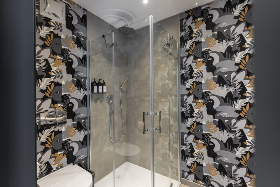Deluxe Double Room, Non Smoking | Bathroom | Shower, rainfall showerhead, hair dryer, heated floors