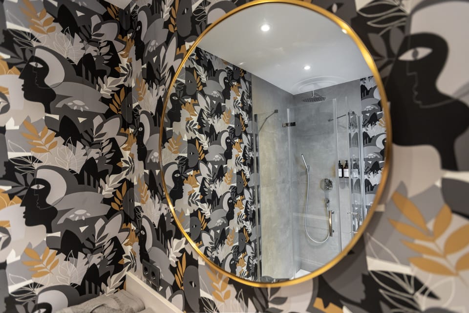 Deluxe Double Room, Non Smoking | Bathroom | Shower, rainfall showerhead, hair dryer, heated floors