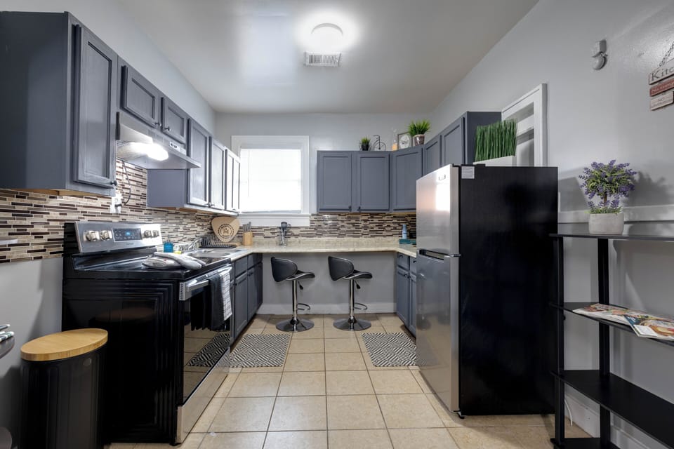 Fully equipped kitchen with stainless steel appliances