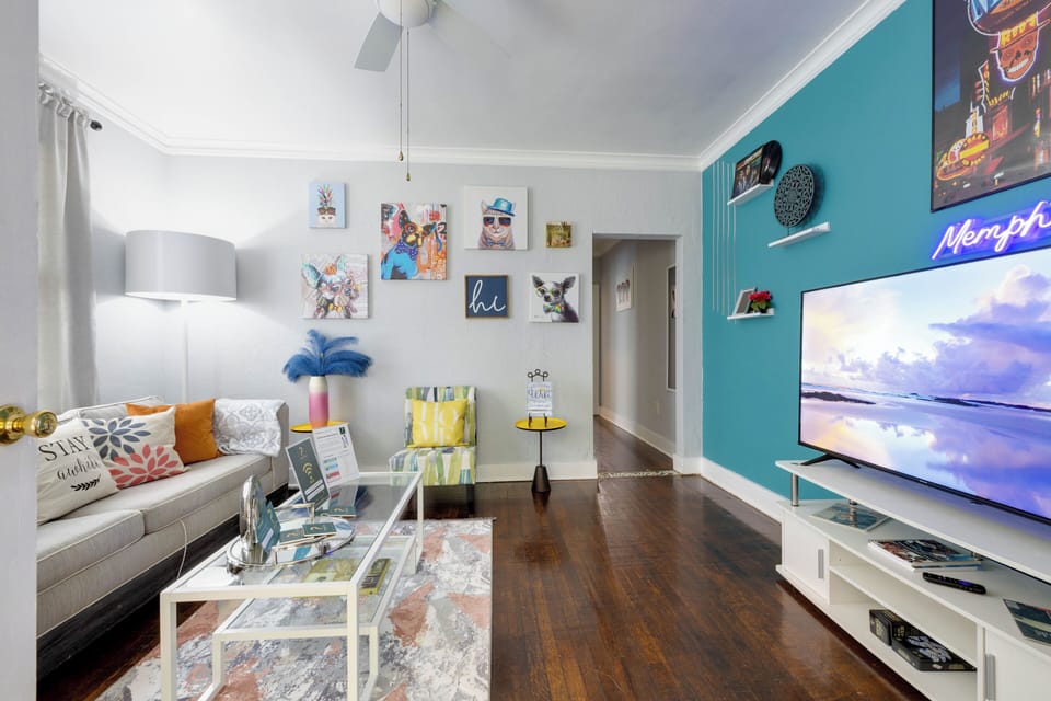 LIVING ROOM features 58 inches smart TV and a sleeper sofa