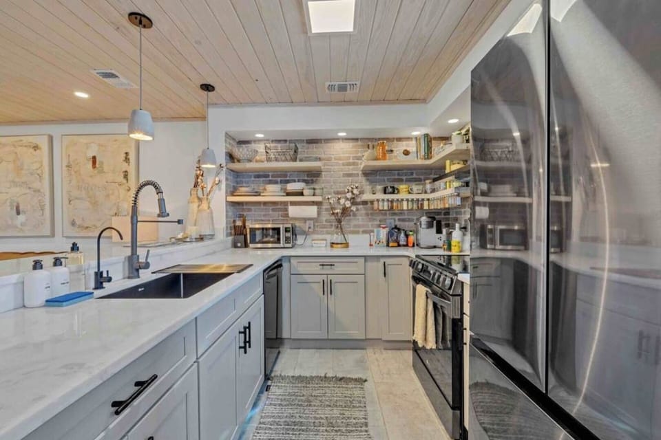Featuring stainless steel appliances and plenty of counter space.