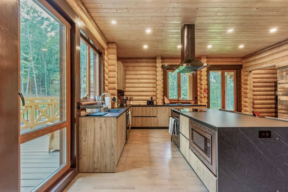 Modern, open-concept kitchen with sleek appliances and plenty of space for cooking and gathering.