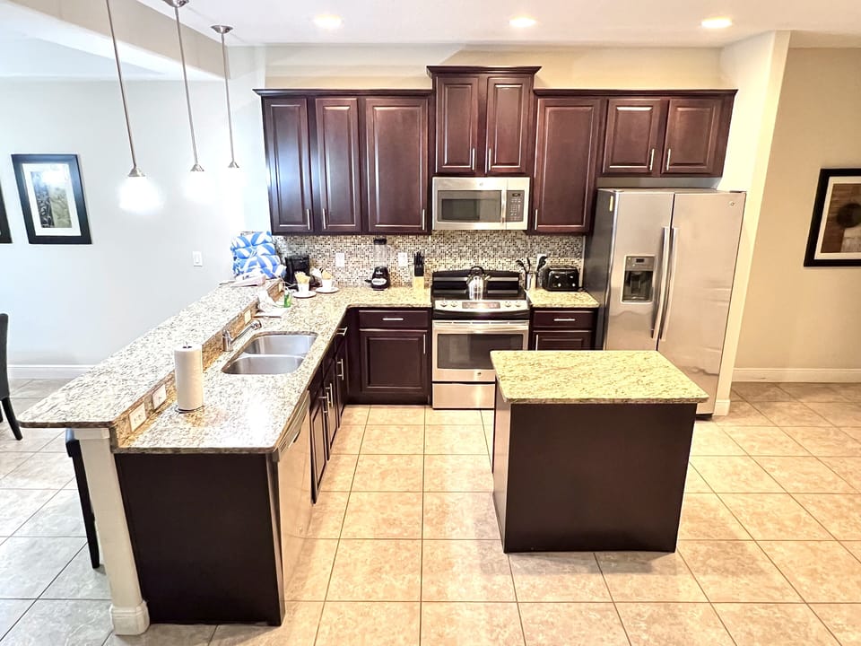 Townhome, 4 Bedrooms | Private kitchen | Coffee/tea maker, fridge, oven, toaster