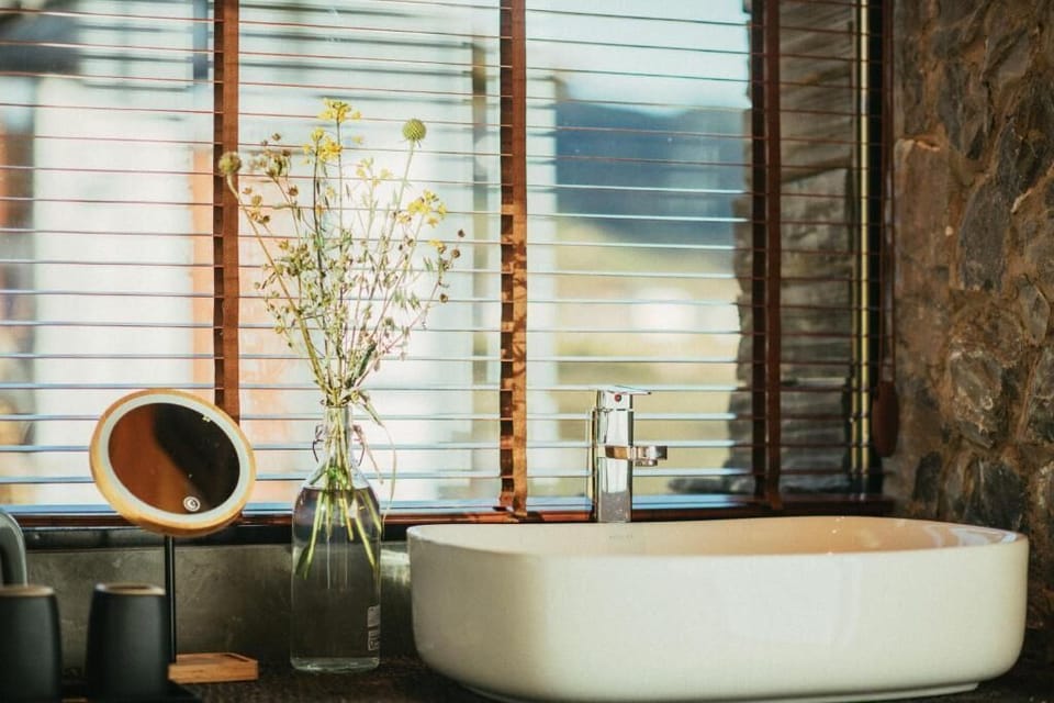 Shower, rainfall showerhead, designer toiletries, hair dryer