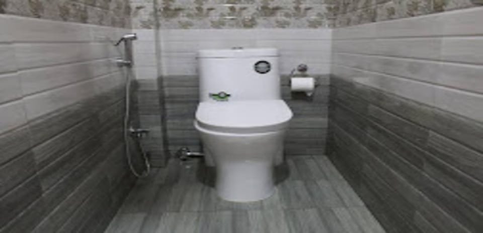 Shower, rainfall showerhead, towels, soap