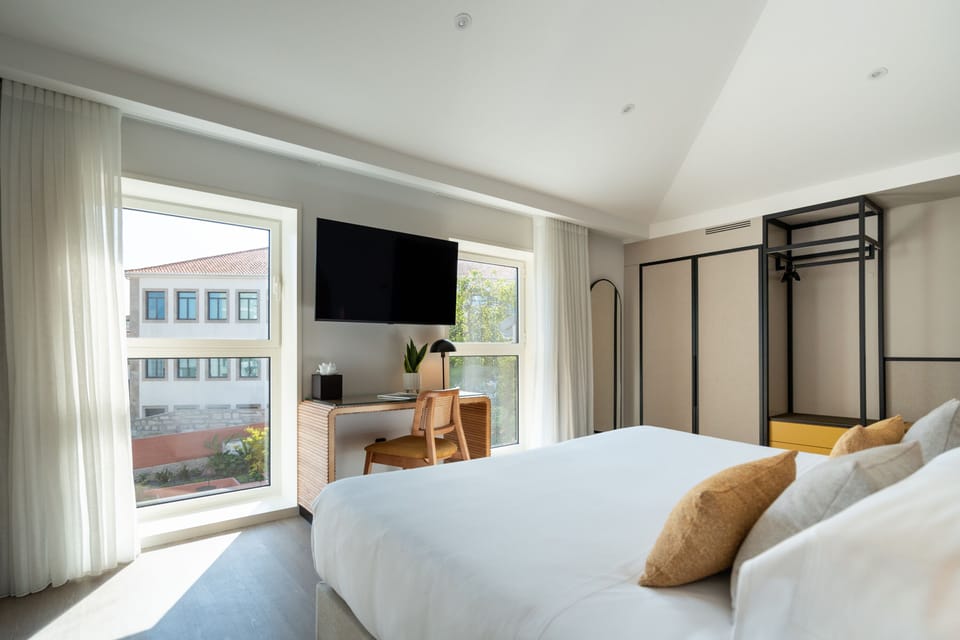 Premium Double Room | Minibar, in-room safe, laptop workspace, blackout drapes