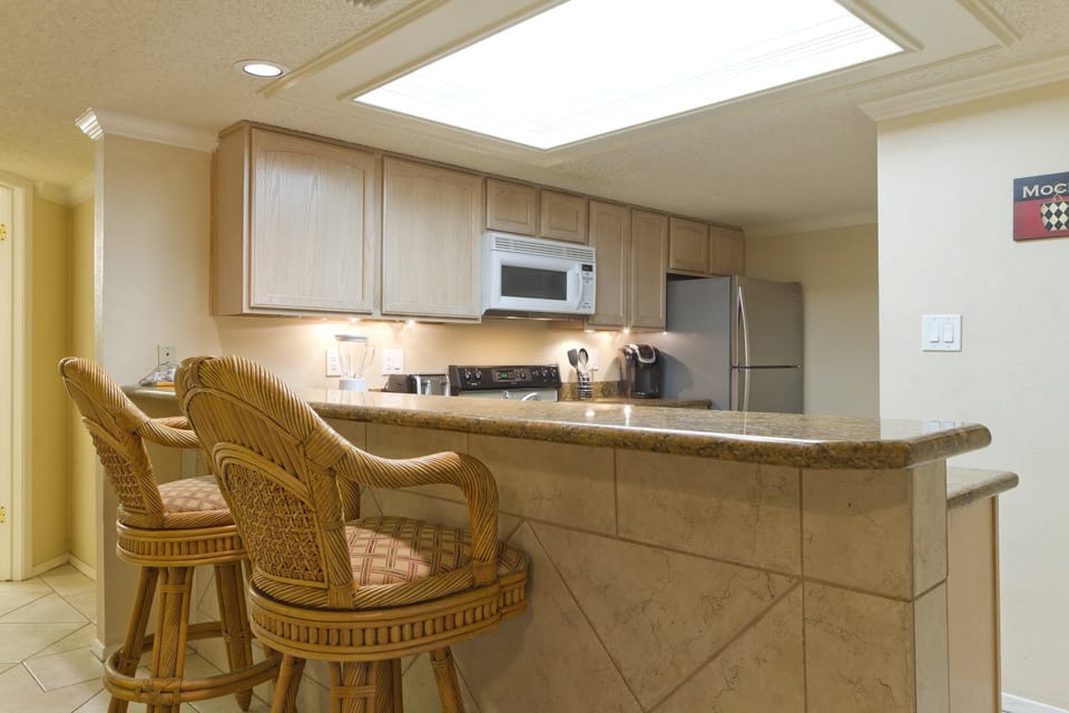 Discover the ultimate spot for snacking, dining, and working at this amazing breakfast bar.