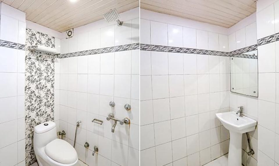 Deluxe Room | Bathroom | Shower, rainfall showerhead, free toiletries, towels