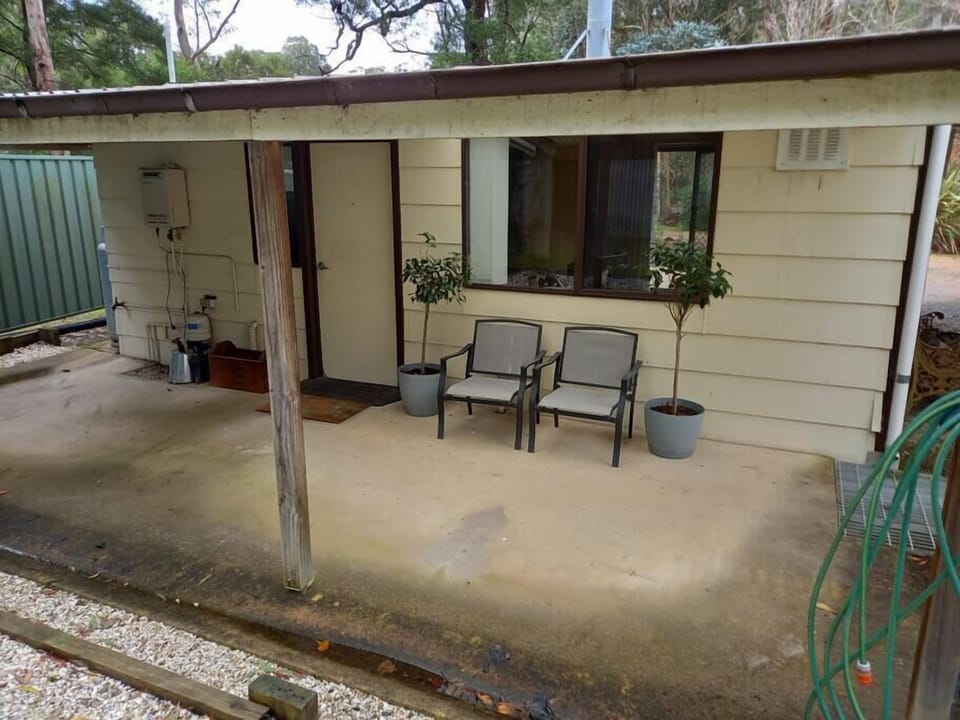Patio with BBQ. Entrance to property. (2)