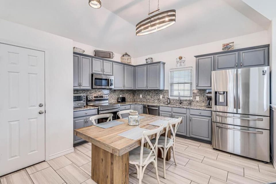 Gather, dine, and unwind in this stylish kitchen spac
