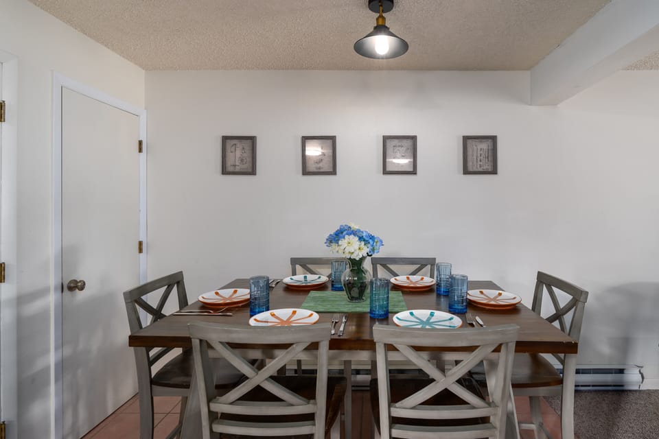 Dining room table with seating for 6.