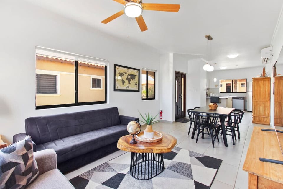 In this condo`s open-concept living area, you can take in the view of Aruba`s beautiful blue skies.