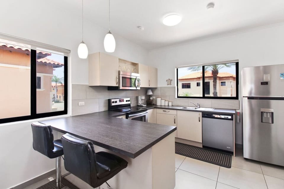 Enjoy preparing your favorite meals in this spacious modern kitchen