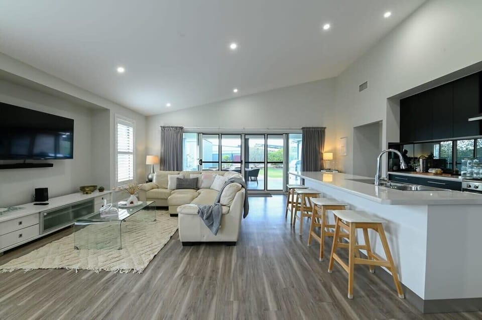 Main Living Space + High Ceilings + Well-equipped Kitchen