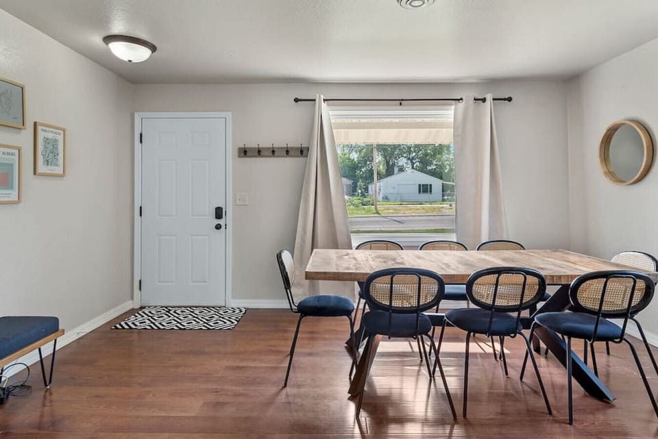The spacious surface of the dining table provides ample room for place settings, delicious culinary creations, and lively conversations.