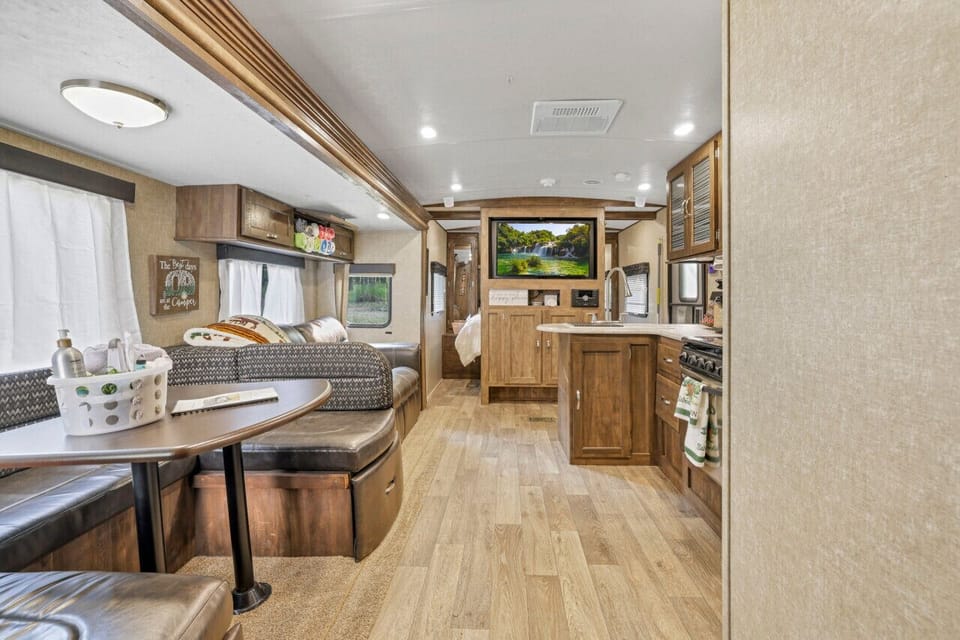 Living area, kitchen, and dining