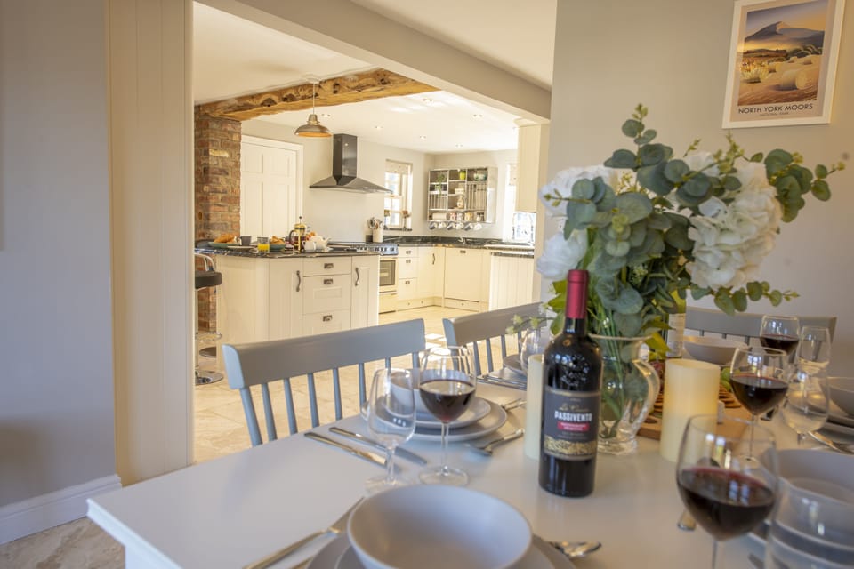Ground floor: Dining area with seating for eight guests