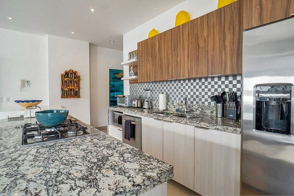 Kitchen amenities also include a microwave, blender and coffee maker