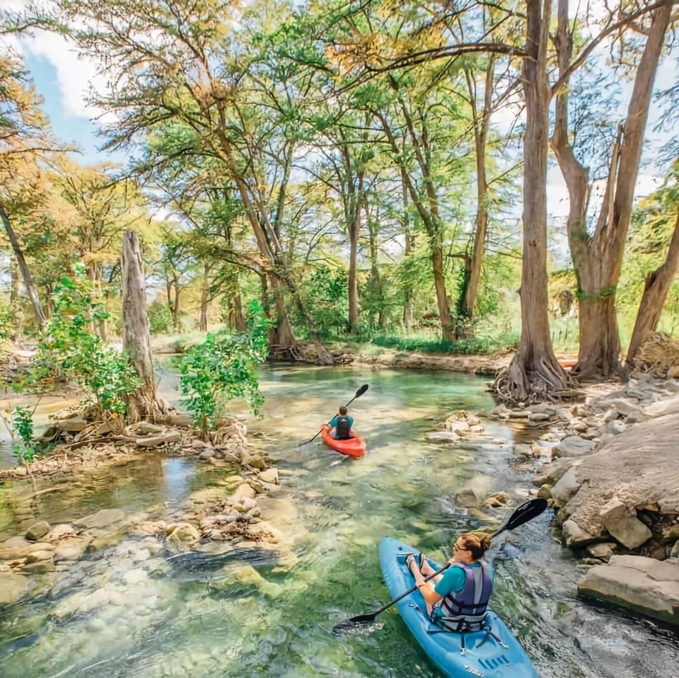 Located one block from the Medina River