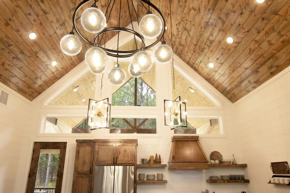 Take in the view of the towering pines that surround the property