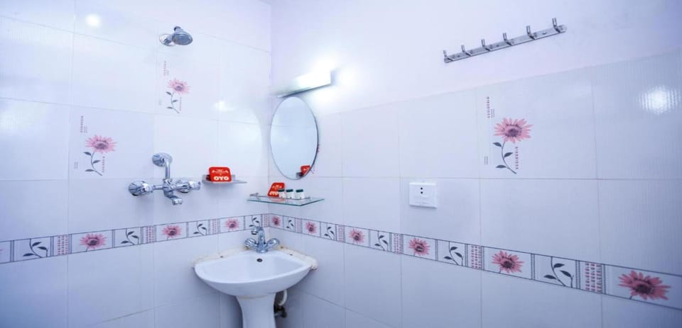 Shower, rainfall showerhead, towels, soap