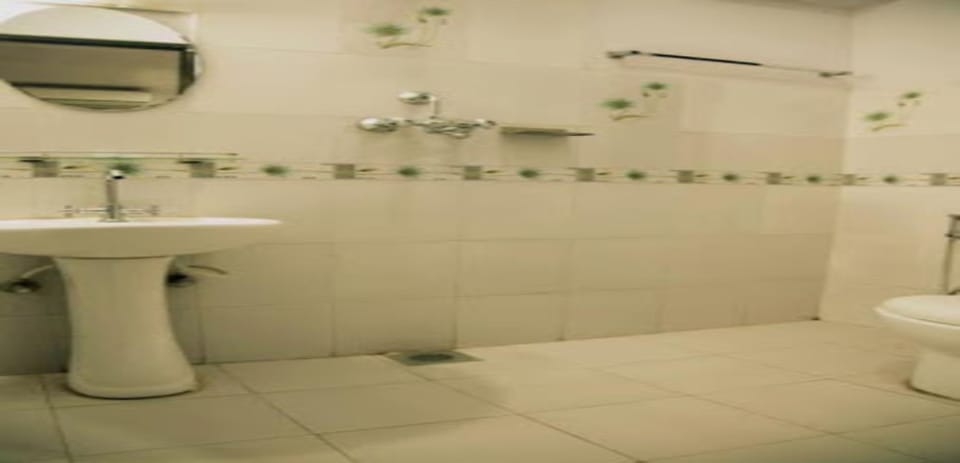 Shower, rainfall showerhead, towels, soap