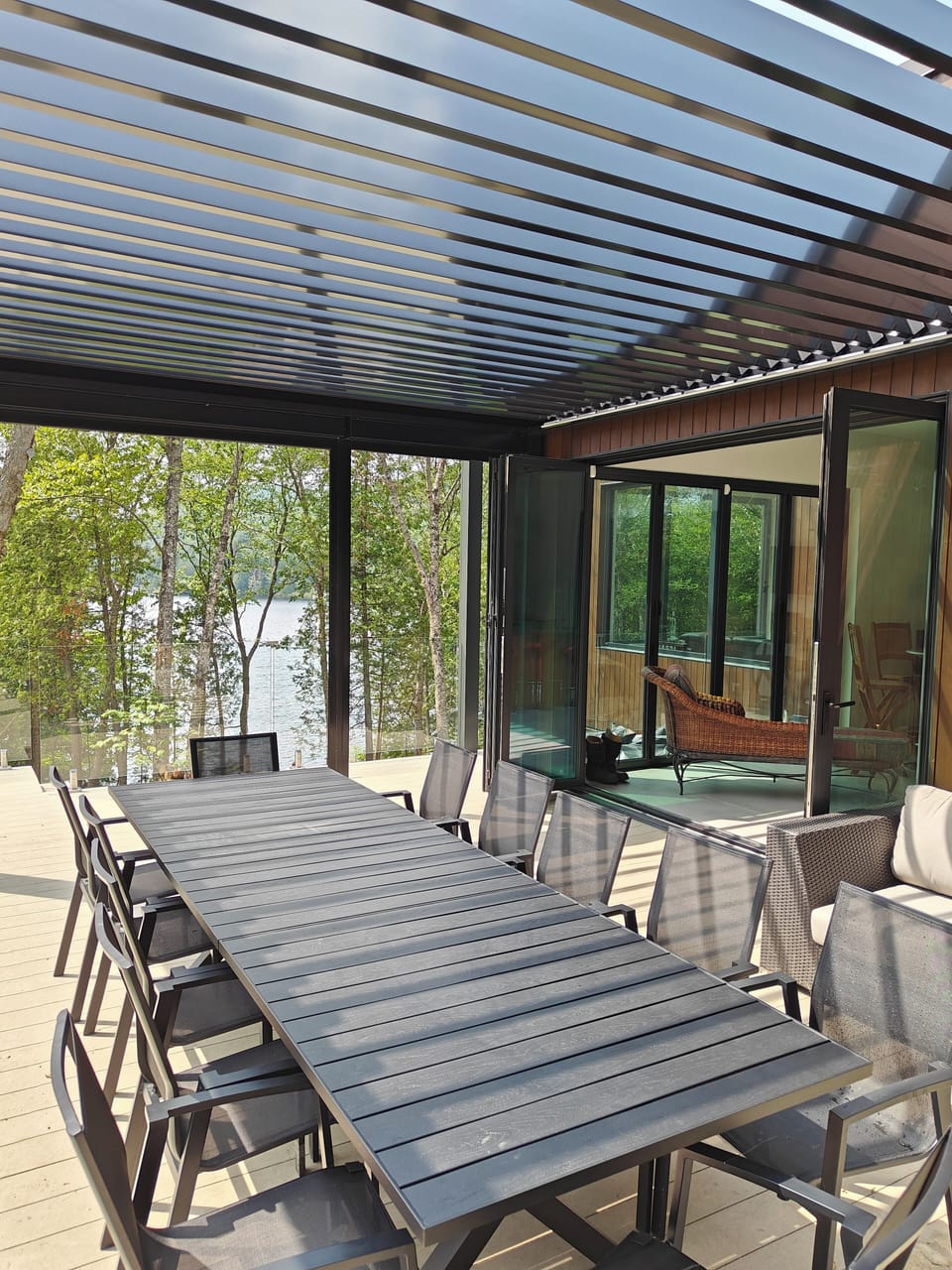 Outdoor dining under the pergola and electric mosquito net