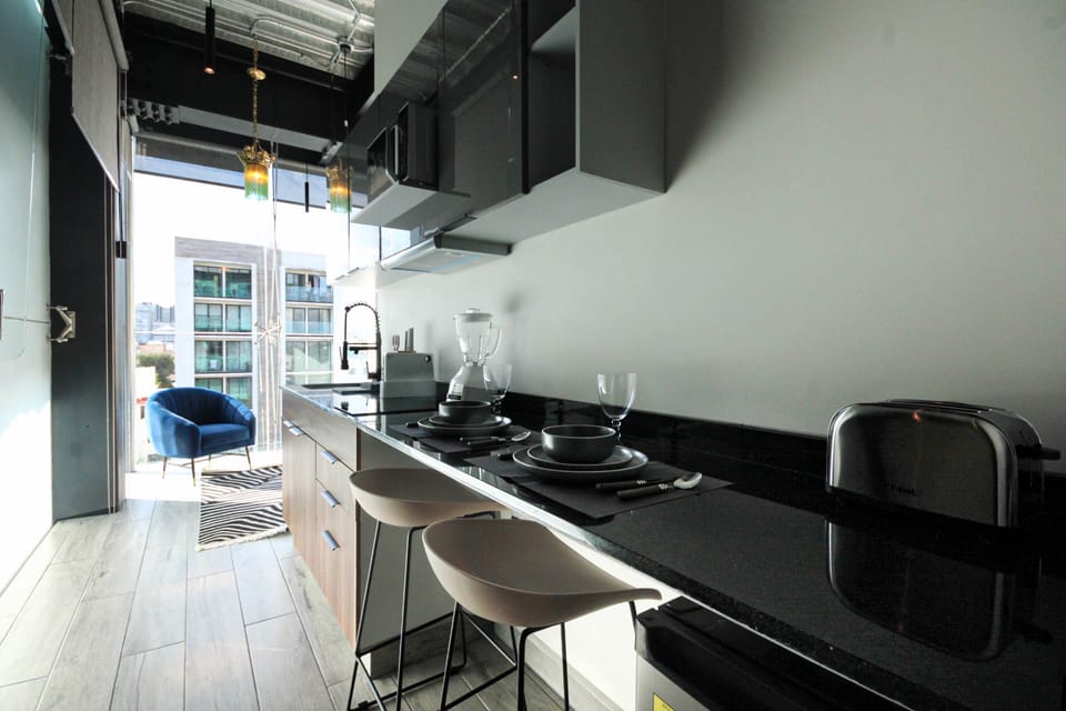 Luxury Loft, 1 Queen Bed, City View (3) | Private kitchen | Shared fridge, microwave, coffee/tea maker, electric kettle