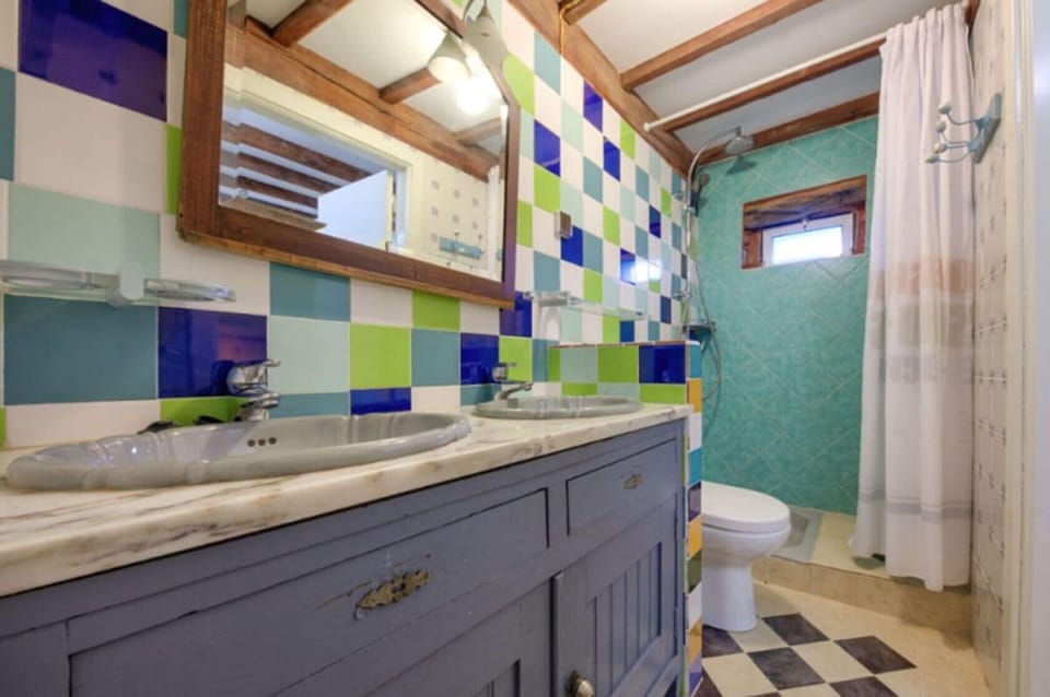 Shower, rainfall showerhead, hair dryer, towels