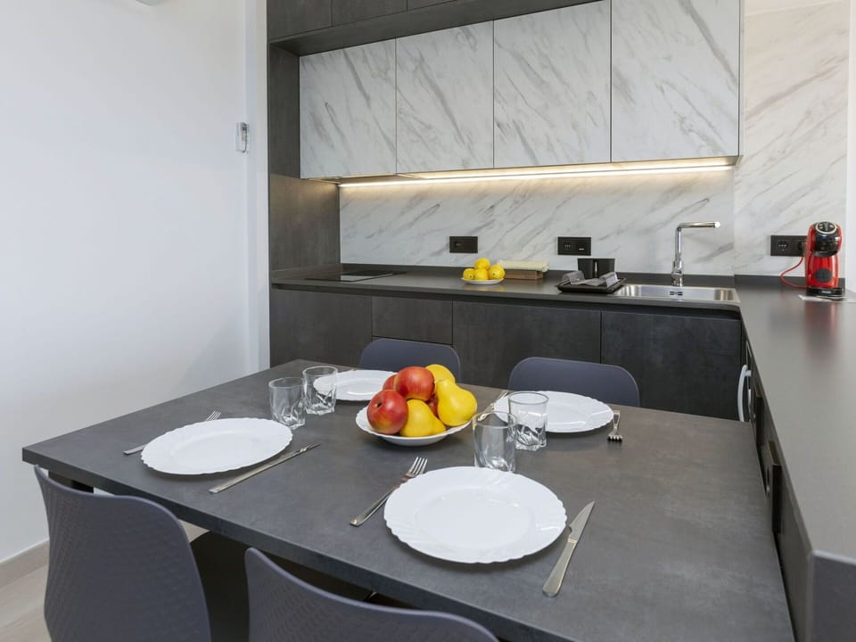 Food, Tableware, Property, Table, Furniture, Countertop, Dishware, Kitchen, Orange, Chair