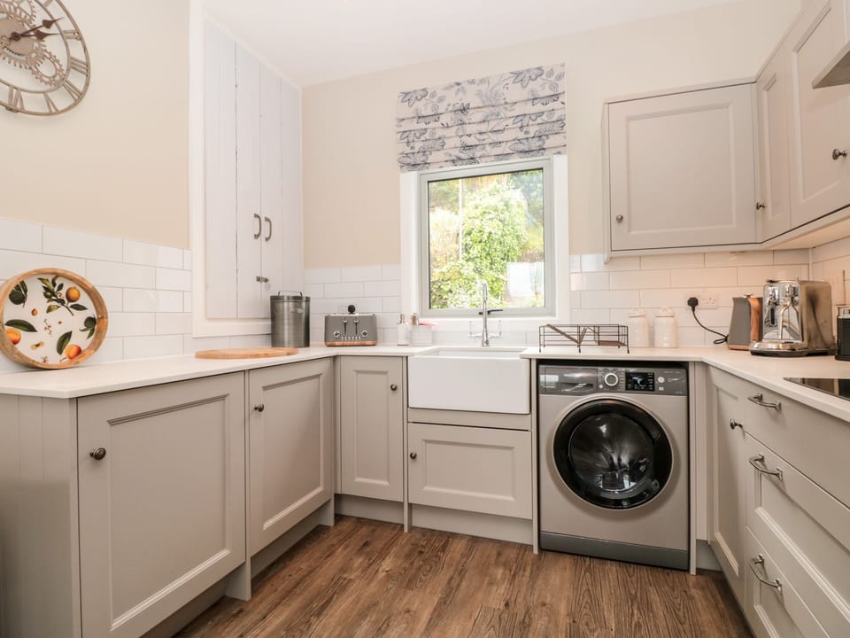 Fridge, electric kettle, toaster, cookware/dishes/utensils