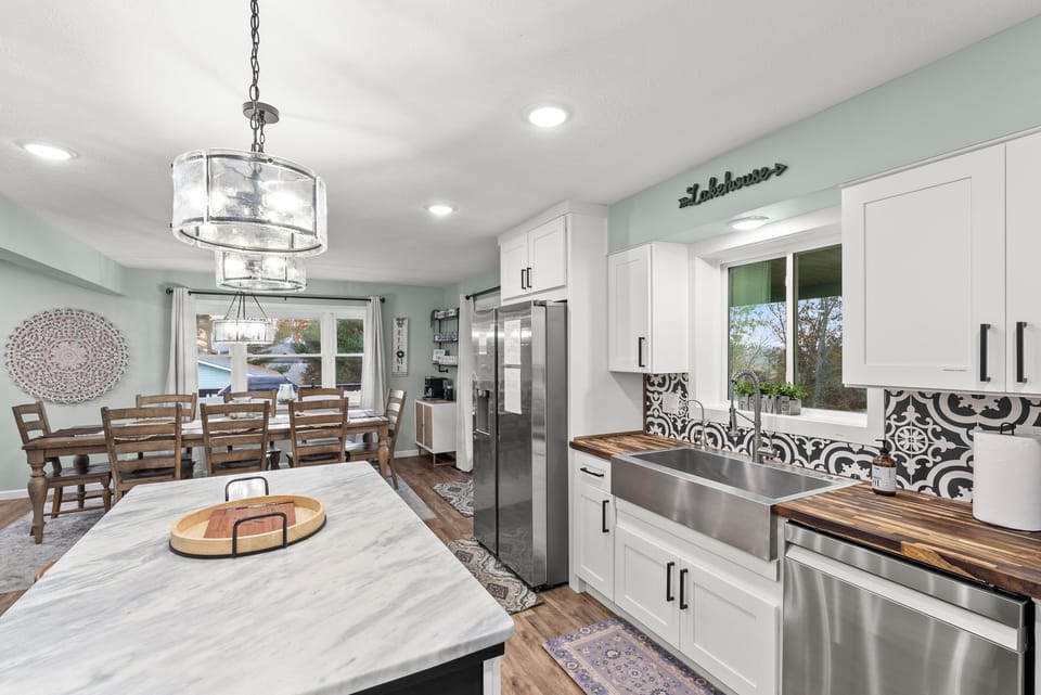 Kitchen stainless steel large and deep bowl sink with garbage disposal. Also a purified water faucet