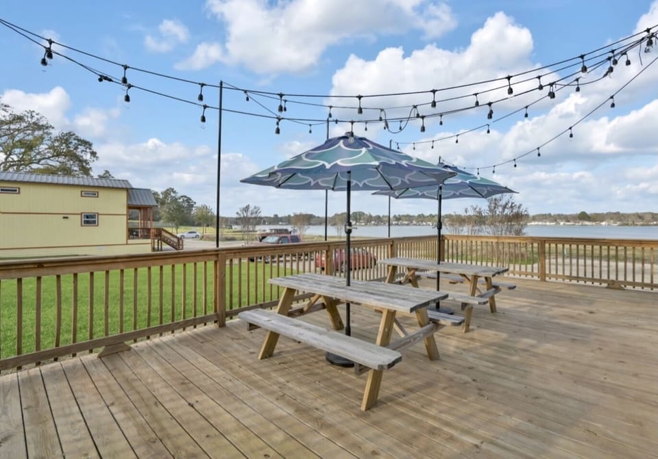 Dining space with shade umbrellas and ambient lighting 