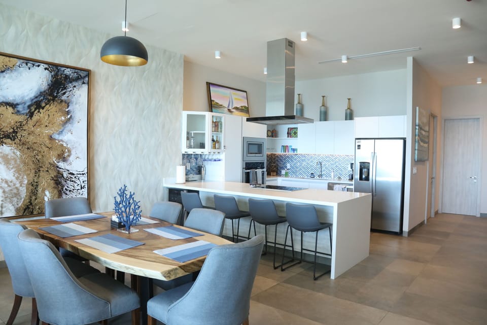 Dining area with living edge table big enough for all to enjoy a family meal