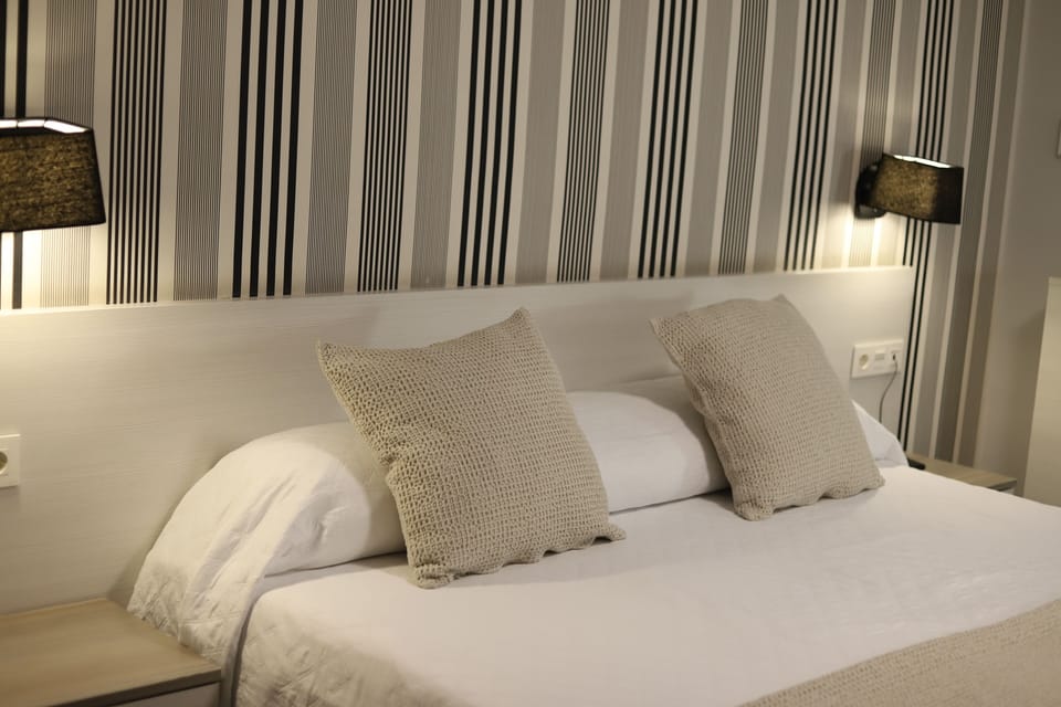 Hypo-allergenic bedding available, desk, blackout drapes, soundproofing