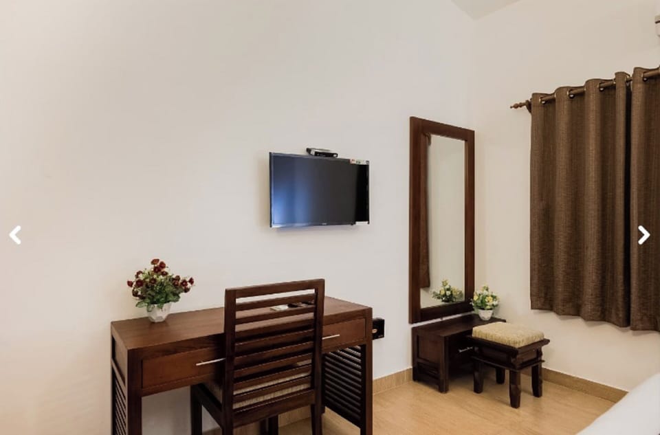 Family Villa | Living area | LED TV, fireplace