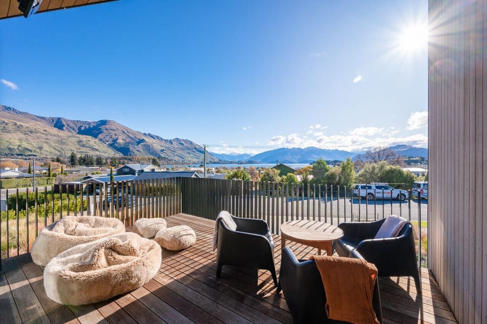 Balcony with mountain and lake views