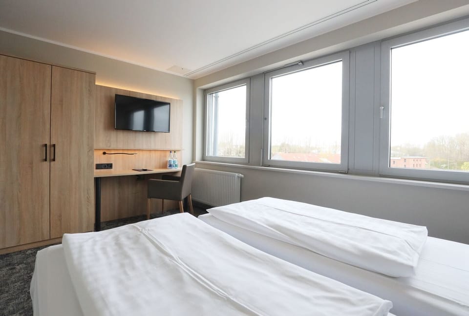 Economy Double Room, 1 Double Bed, Non Smoking | Minibar, desk, laptop workspace, free WiFi