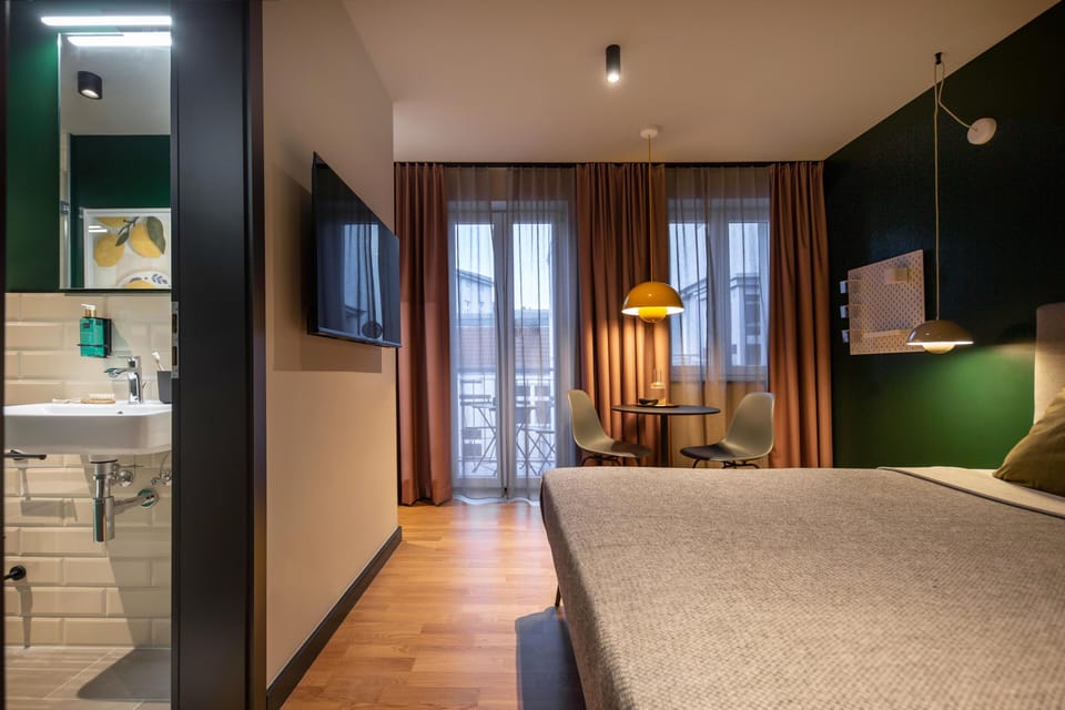 Standard Apartment, 1 Queen Bed, Balcony (Full Kitchen) | In-room safe, blackout drapes, soundproofing, free WiFi