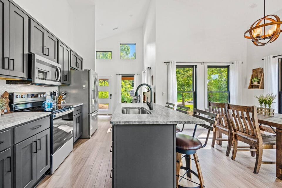 Kitchen and dining area are conveniently located together and are perfect for making meals and enjoying them together.