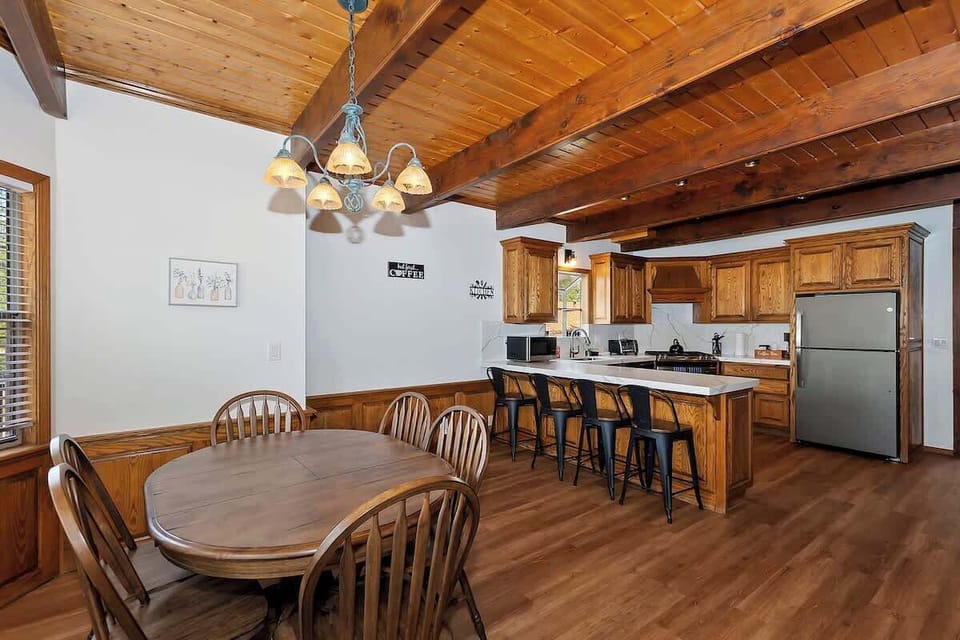 Dining table and kitchen. 