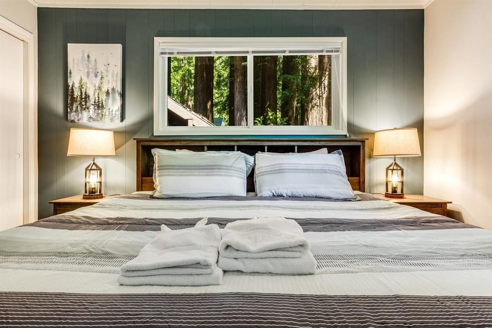 Bedroom 1 w/ a King bed