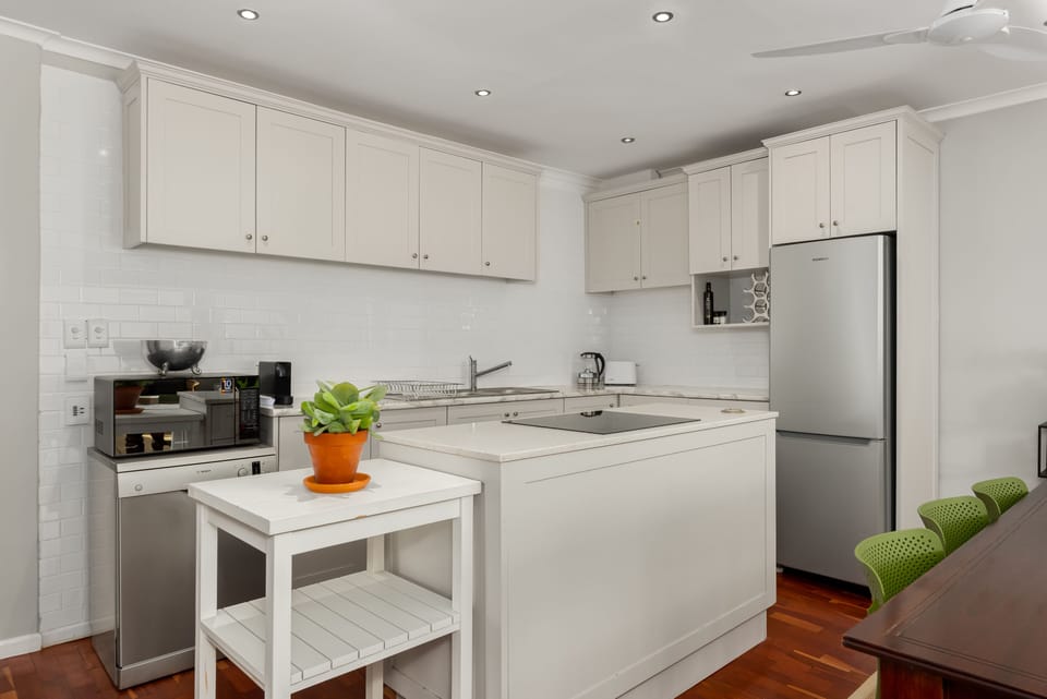 Grand Apartment | Private kitchen | Fridge, microwave, oven, stovetop