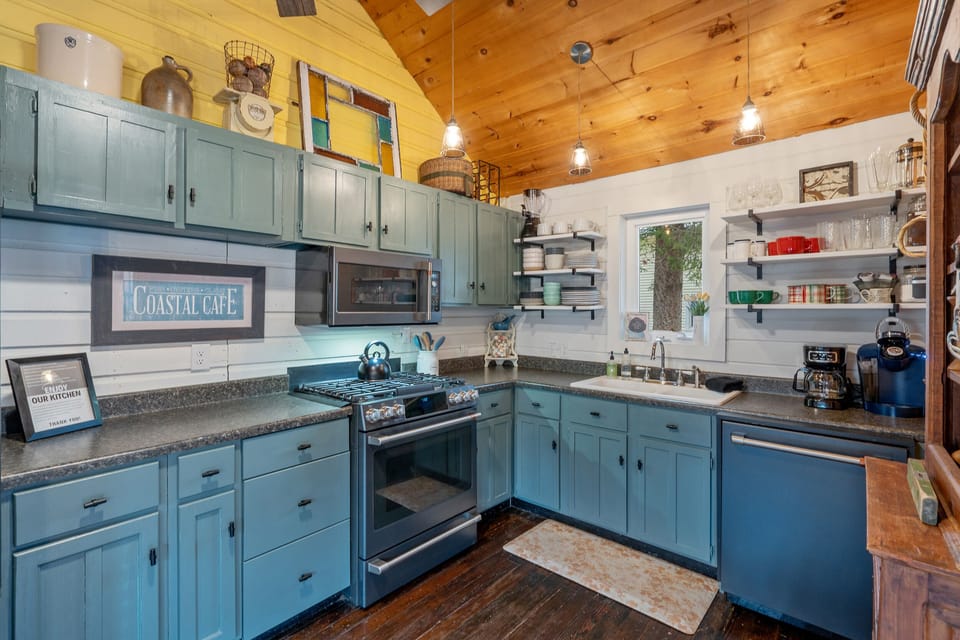 Our kitchen is fully stocked with easy access to dishes and glassware!