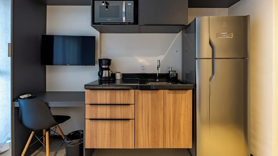 Standard Double Room | Private kitchen | Coffee/tea maker, fridge, microwave, cookware/dishes/utensils
