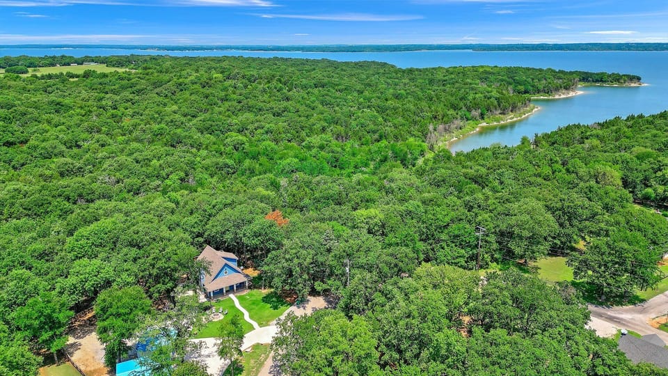 Arial view of property and fishing cove